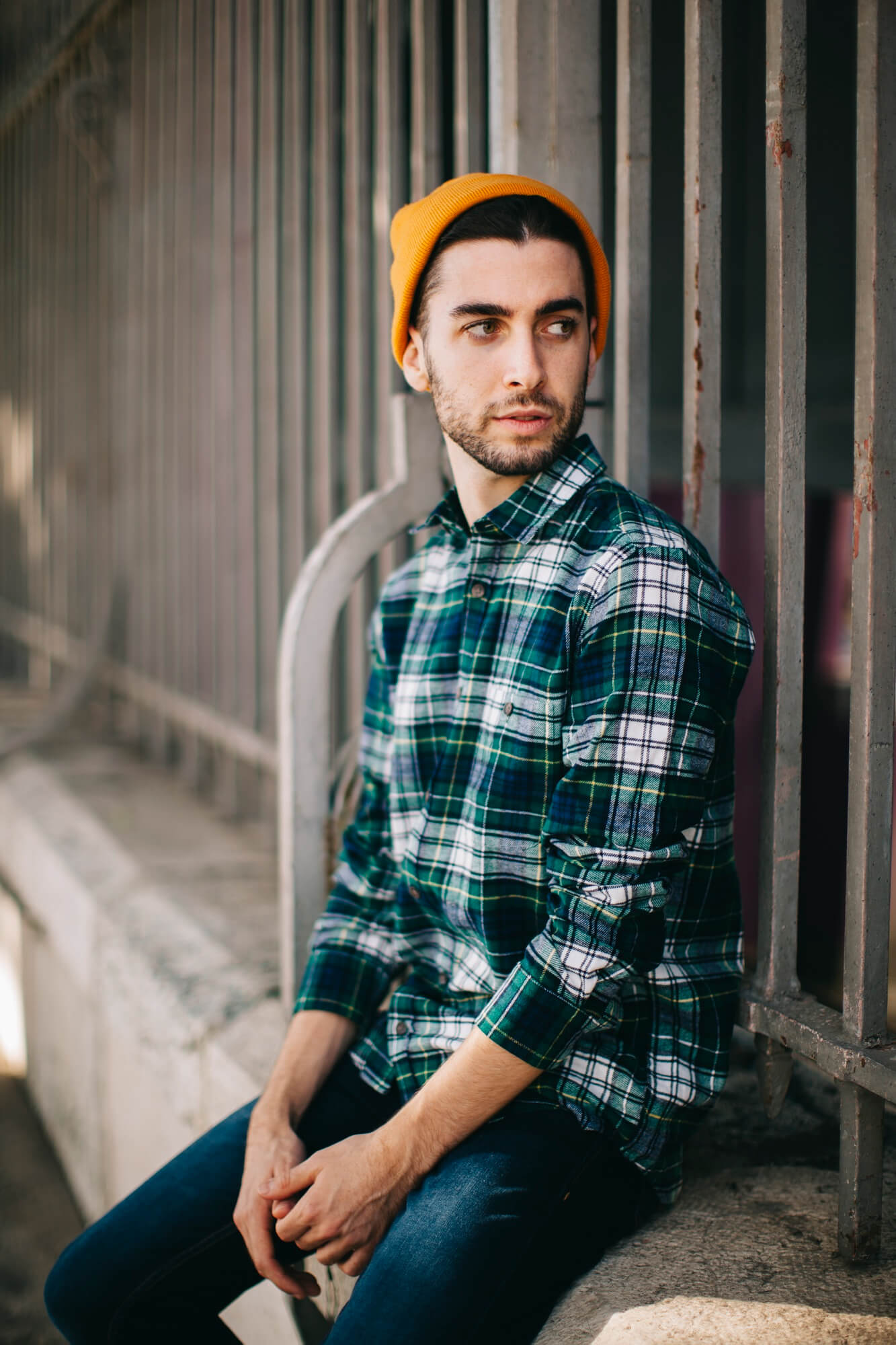 young man with hat looking for redemption